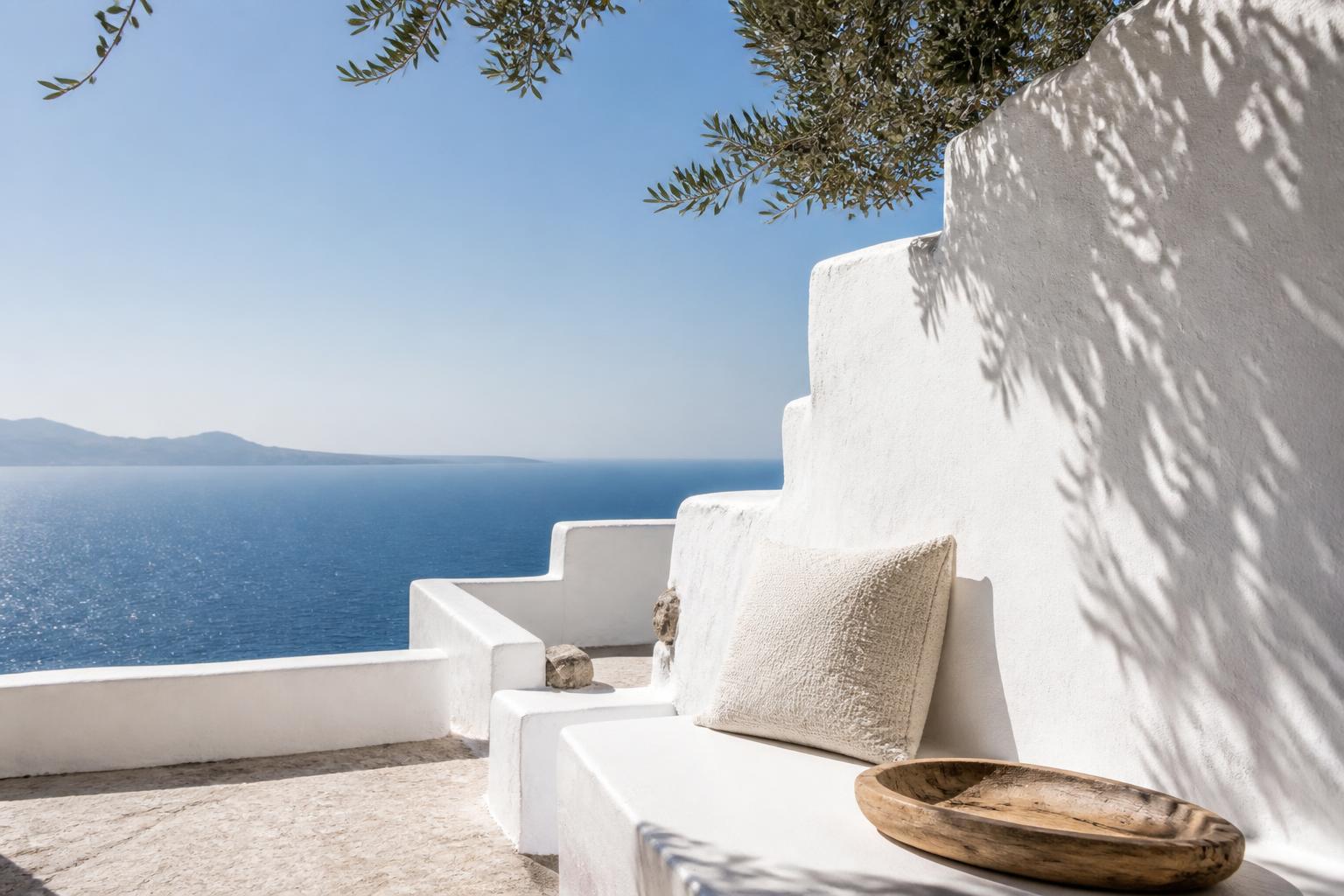 Whitewashed terrace above the Aegean sea